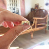 Anello arcobaleno dettaglio pietre preziose oro
